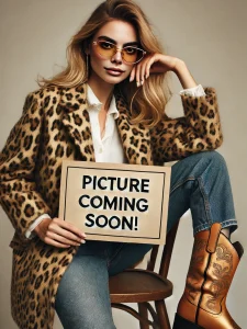 dalle-2024-11-14-13.03.52-a-31-year-old-woman-with-blonde-hair-and-brown-eyes-wearing-golden-reading-glasses-sitting-on-a-chair.-she-is-dressed-in-a-leopard-print-coat-jeans